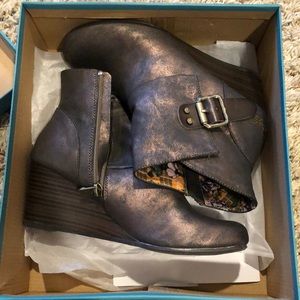 Metallic wedge booties